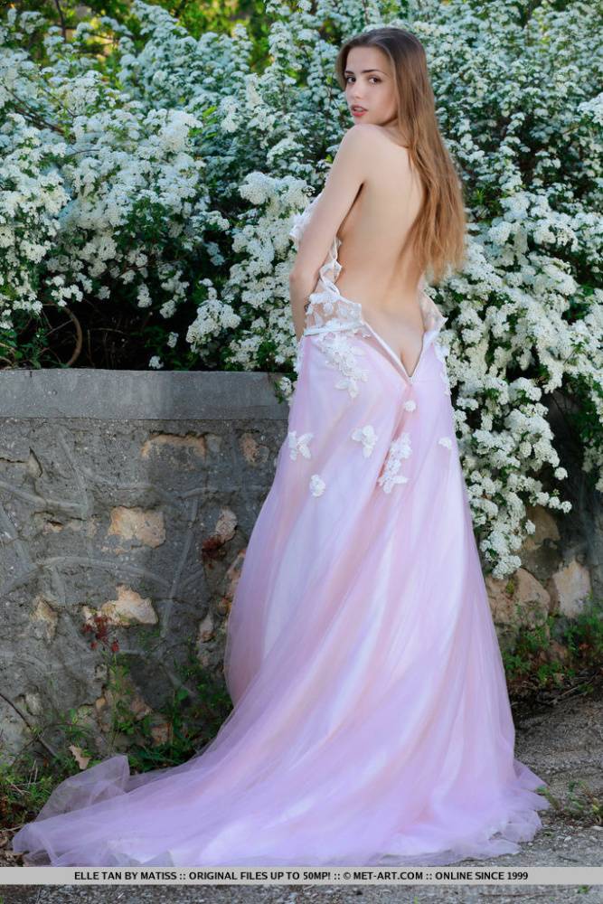 Beautiful girl Elle Tan slips off wedding dress to pose nude in garden - #5