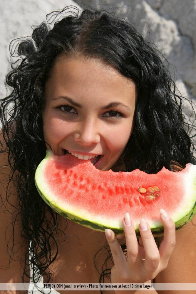 Young amateur Amber Pearl consumes a watermelon while naked on boulders - #13