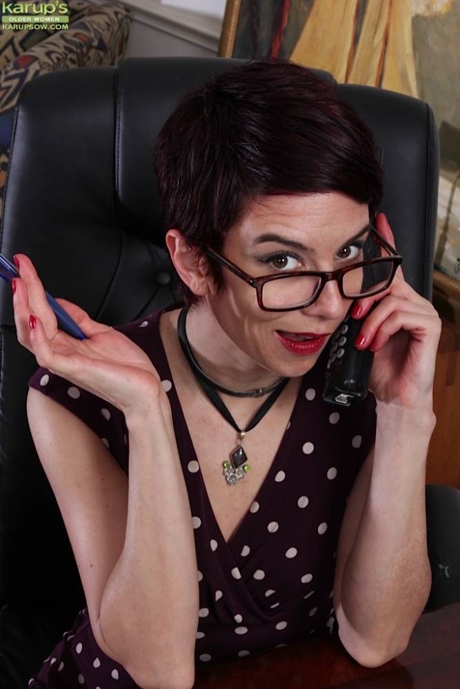 Petite mature woman Nikki Lee posing fully clothed in glasses for nerd look - #7
