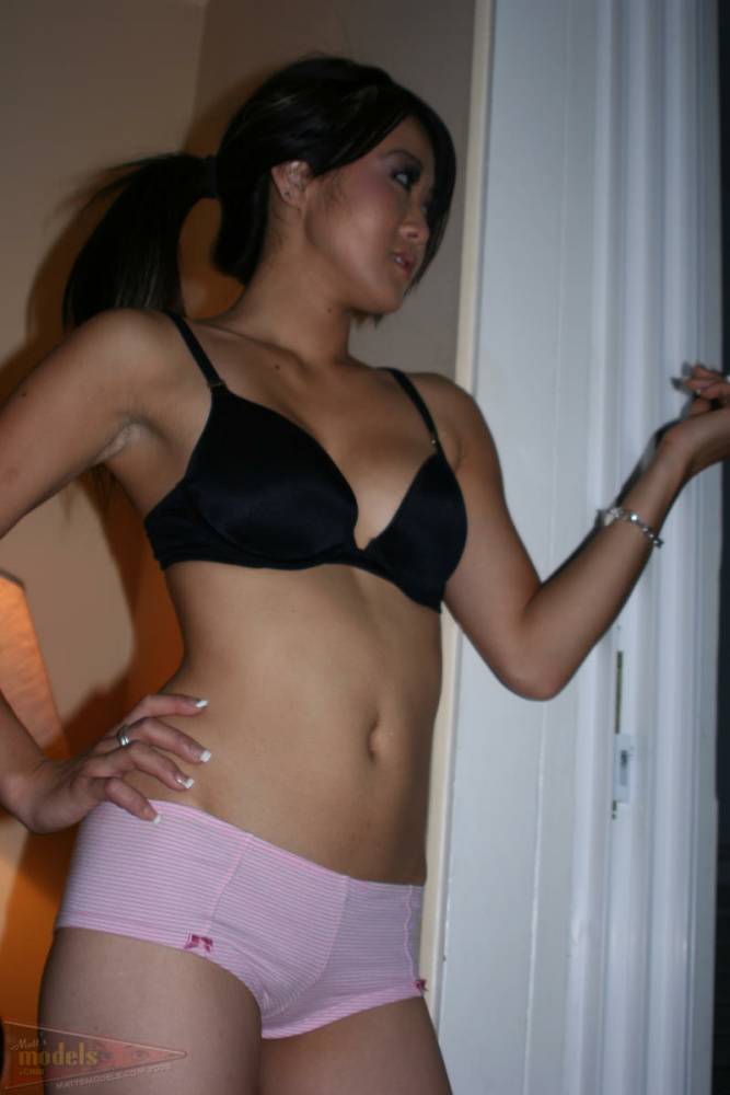 Asian first timer Taya pauses for a smoke break in her bra and panties - #15
