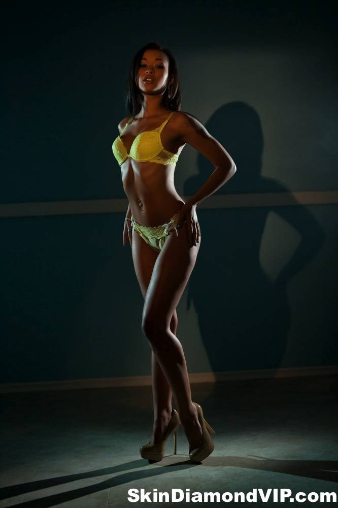 Sexy ebony Skin Diamond sheds yellow hot lingerie to pose naked on the stage - #2