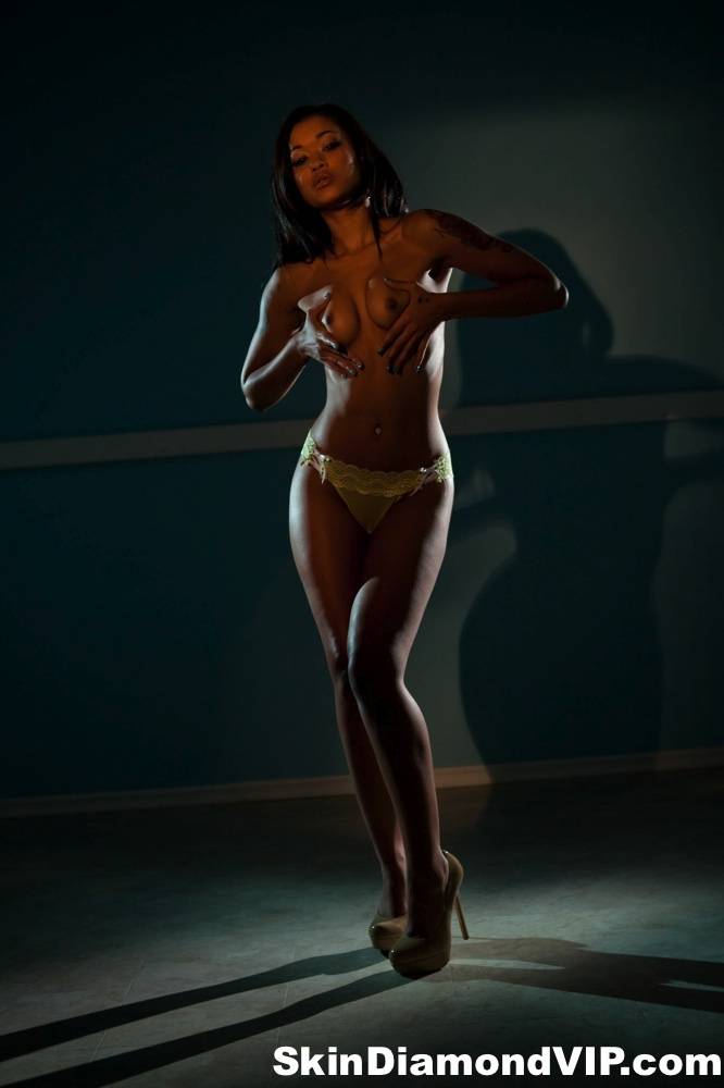 Sexy ebony Skin Diamond sheds yellow hot lingerie to pose naked on the stage - #7