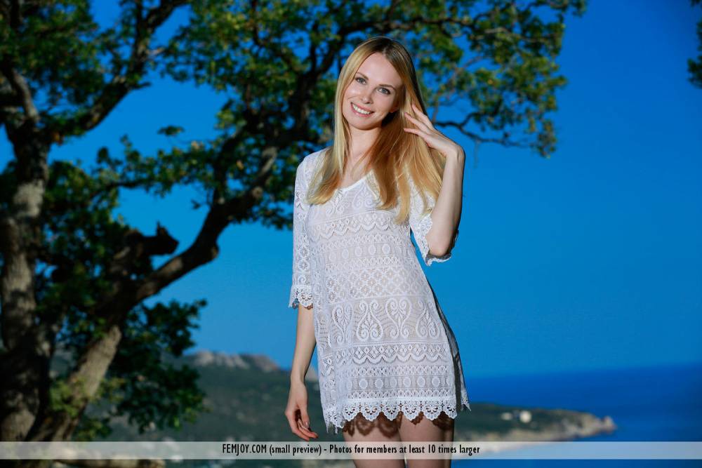 Long legged blonde beauty Inga S gets totally naked on an oceanside cliff - #5