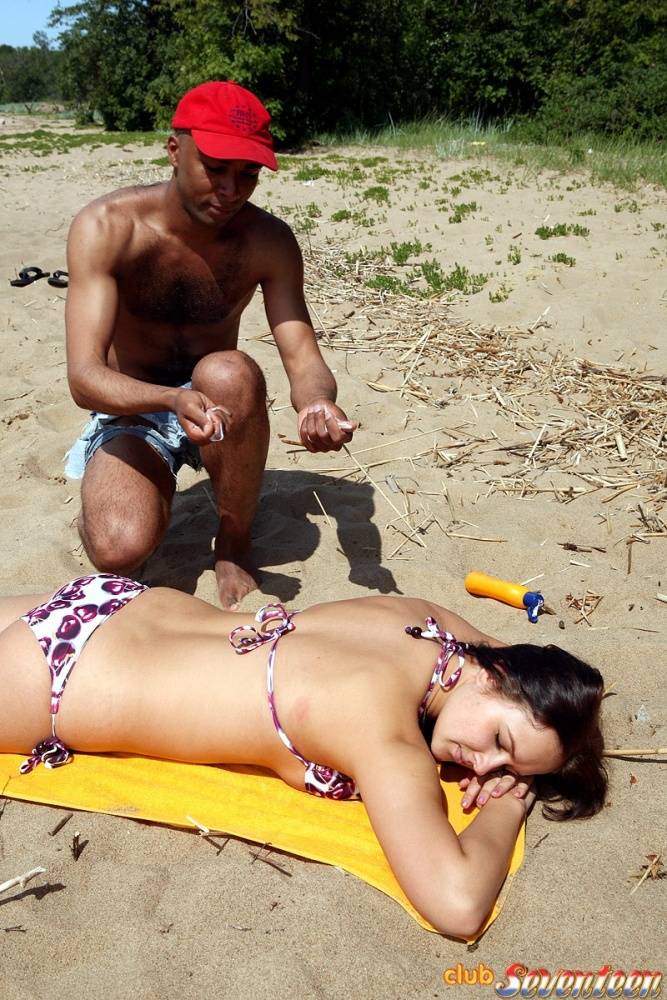 Busty teen girl has sex with a local while vacationing on a sandy beach - #12