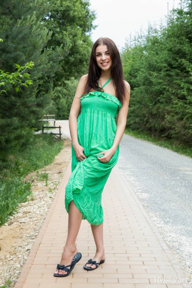 Sweet teen Evita Lima sets her great body free of a long dress on a sidewalk - #1