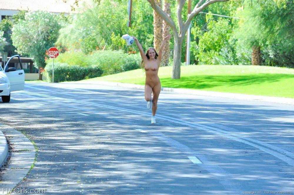 Amateur girl strips to her sneakers before jogging down a street in the nude - #12