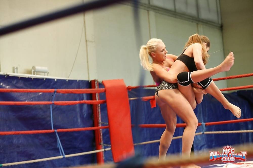 Seductive sporty babes are into catfight ending with lesbian action - #16