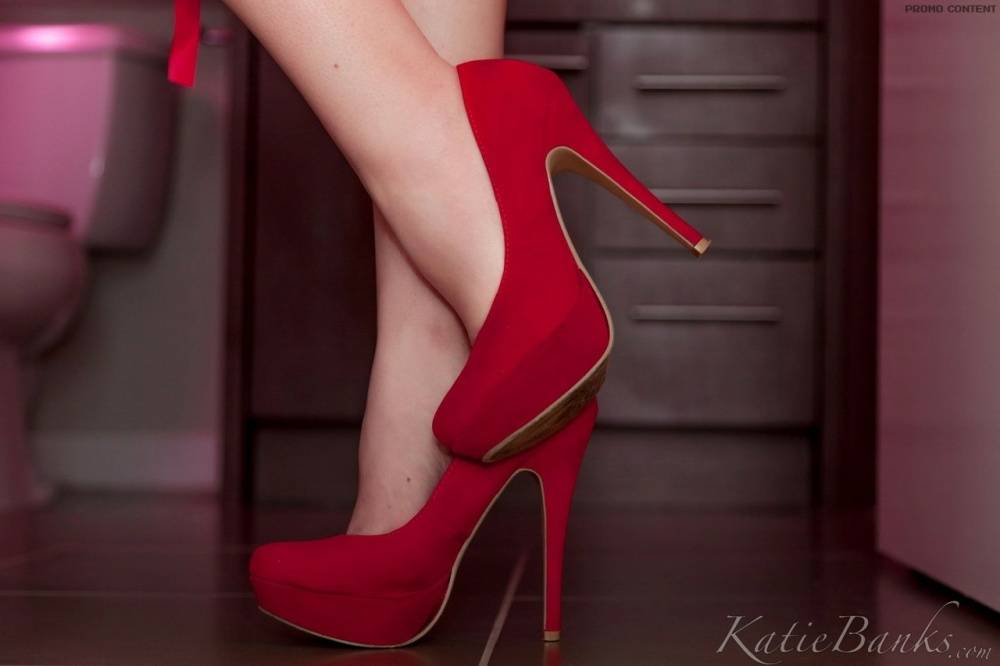 Amateur model Katie Banks teasingly removes a revealing red dress - #13