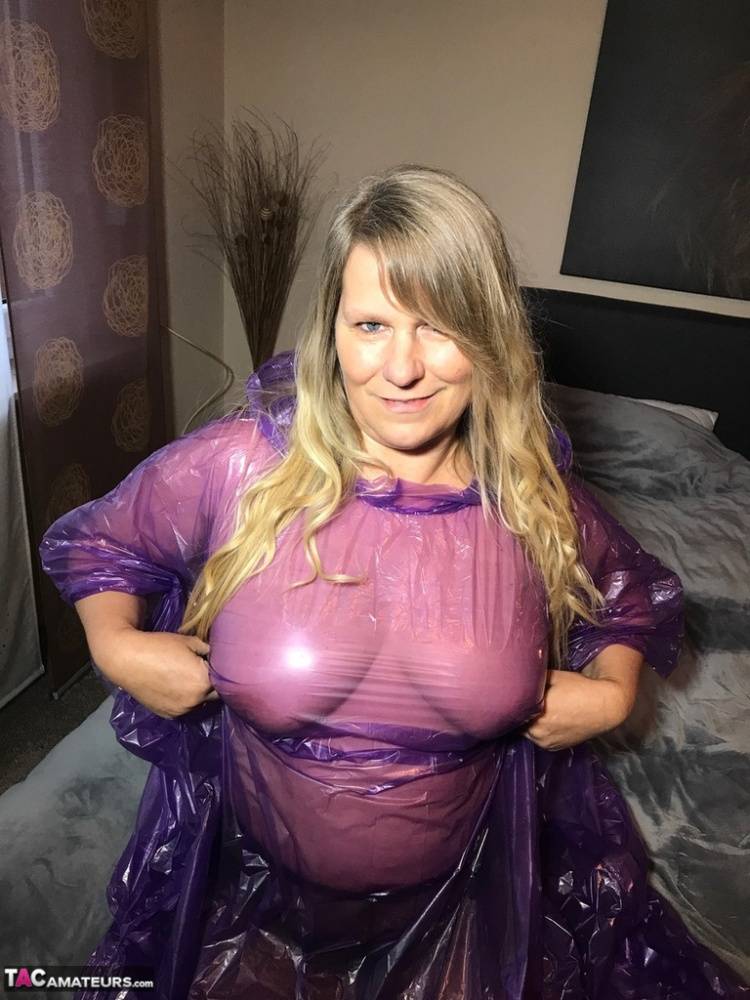 Mature amateur Sweet Susi lifts up a see-through raincoat to show her snatch - #5
