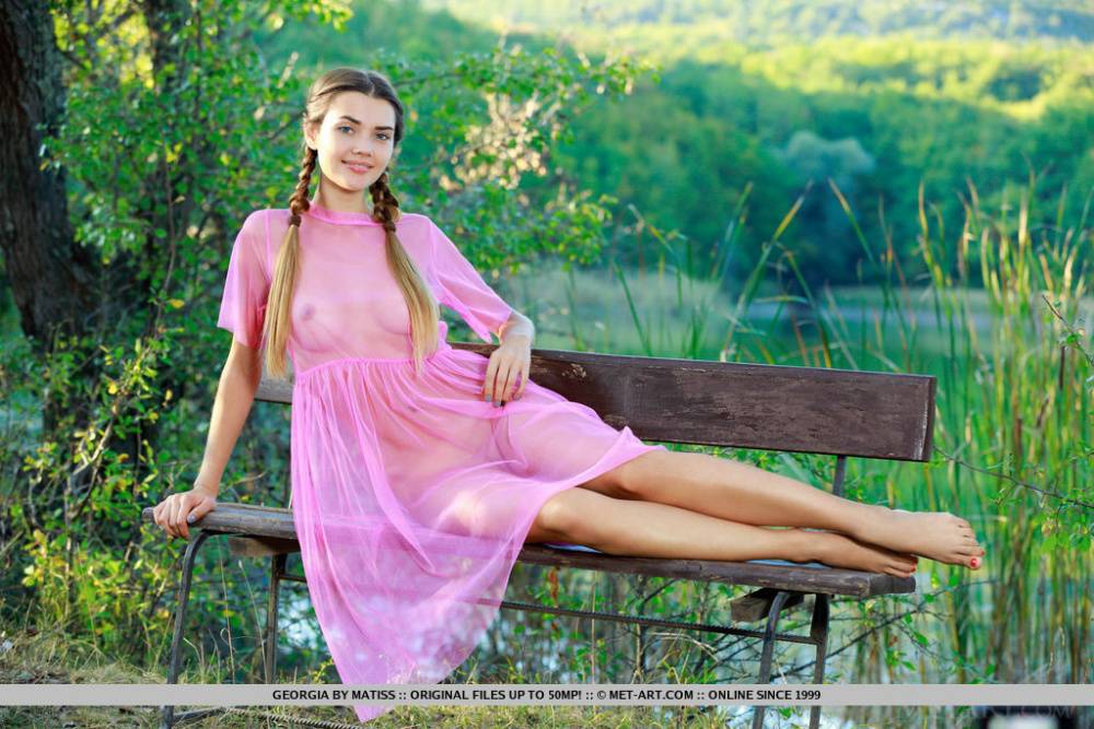 Adorable teen Georgia doffs a sheer pink dress to pose nude at a lookout spot - #6