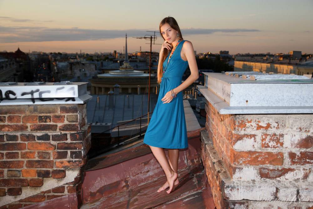 Pretty 18 year old Sofy B gets totally naked on the roof of a building - #16