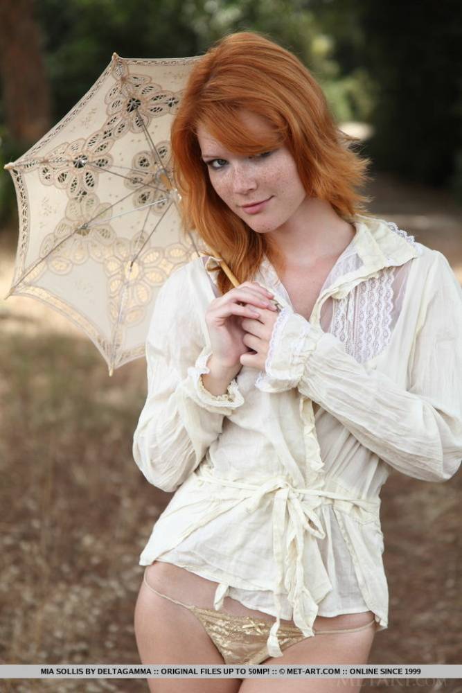 Freckled redhead Mia Sollis goes fr a nature walk completely naked - #16
