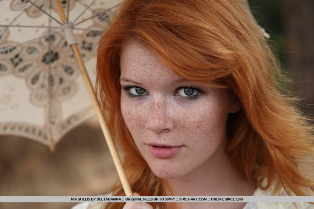 Freckled redhead Mia Sollis goes fr a nature walk completely naked - #3