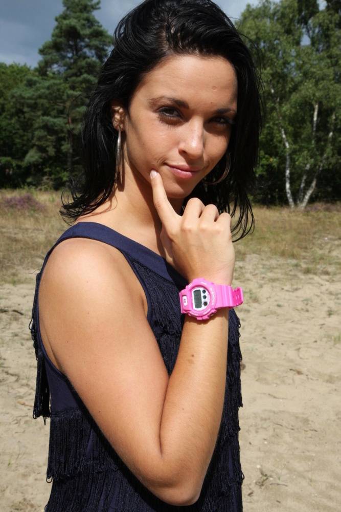 Brunette girl Nora is handcuffed to a tree while wearing a pink G-Shock watch - #1