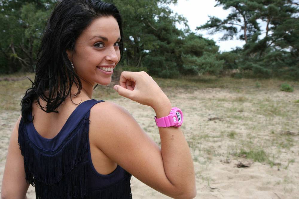 Brunette girl Nora is handcuffed to a tree while wearing a pink G-Shock watch - #7