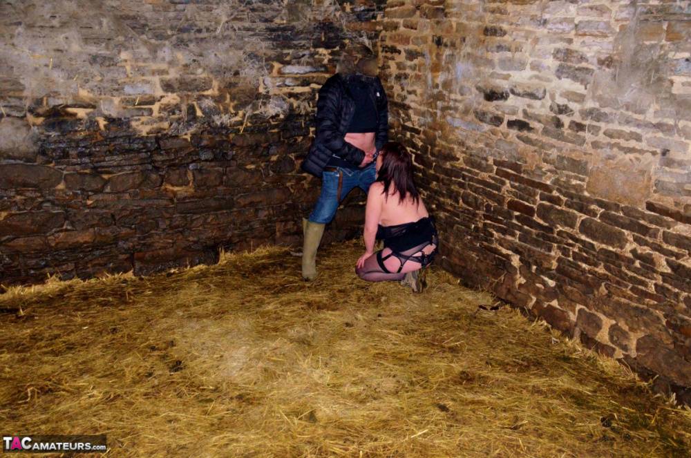 Busty British amateur Juicey Janey pees in a trough after sex in a barn - #6