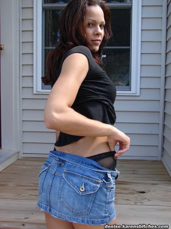 White amateur flashes upskirt panties in a denim skirt on wooden steps - #1