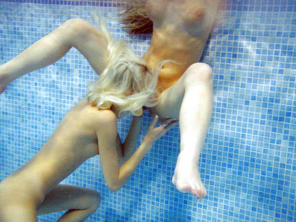 Petite teenage chicks have some lesbian fun using their toys in the pool - #4