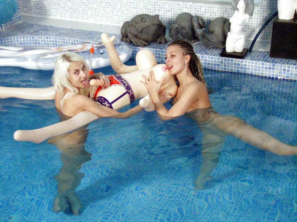 Petite teenage chicks have some lesbian fun using their toys in the pool - #3