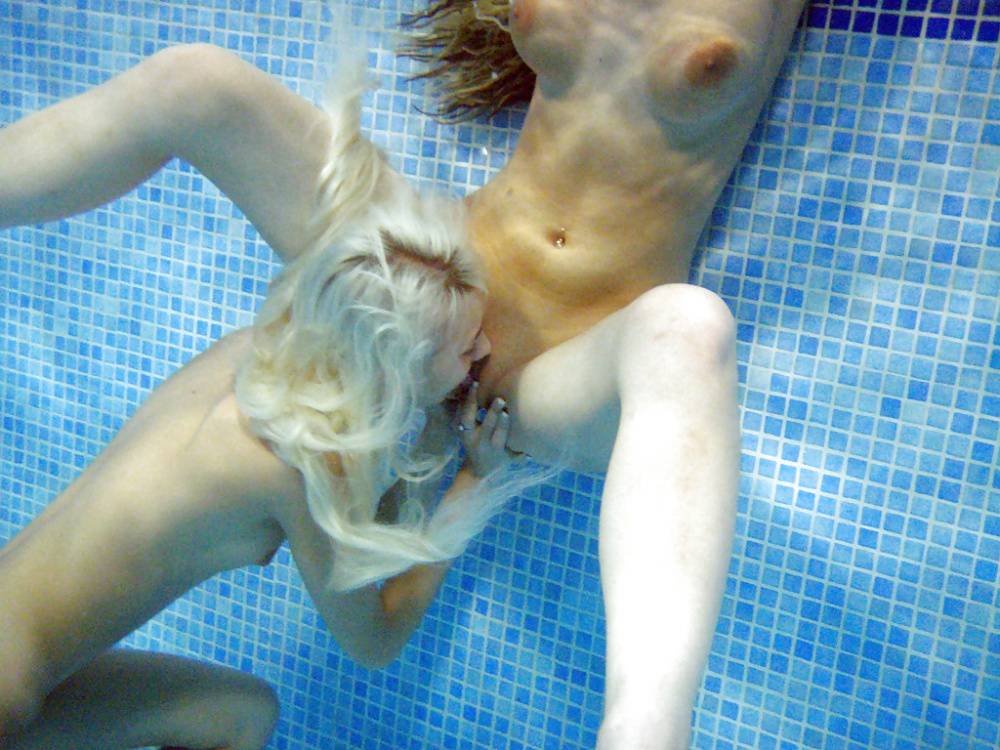 Petite teenage chicks have some lesbian fun using their toys in the pool - #1