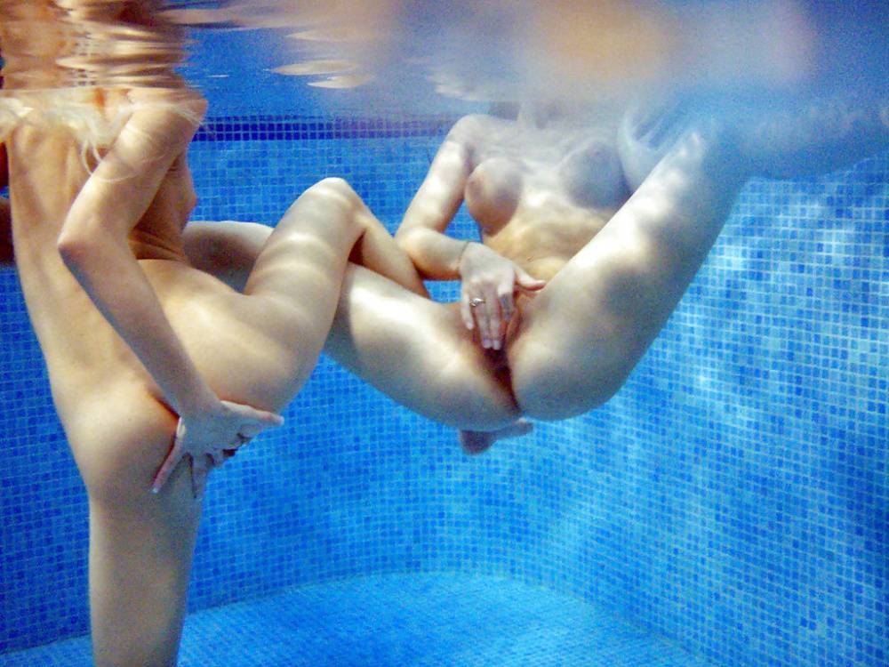 Petite teenage chicks have some lesbian fun using their toys in the pool - #14