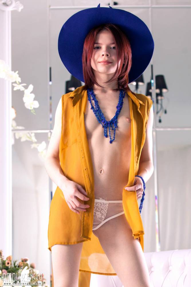 Fair skinned teen with red hair strikes sensual nude poses in a sun hat - #9