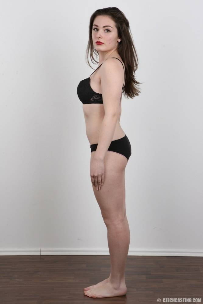 Brunette model Eva peels black panties and bra for a photo audition - #7