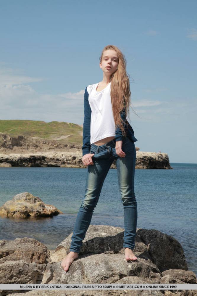 Skinny girl Milena D sheds jeans on beach to show bald twat underwater - #2