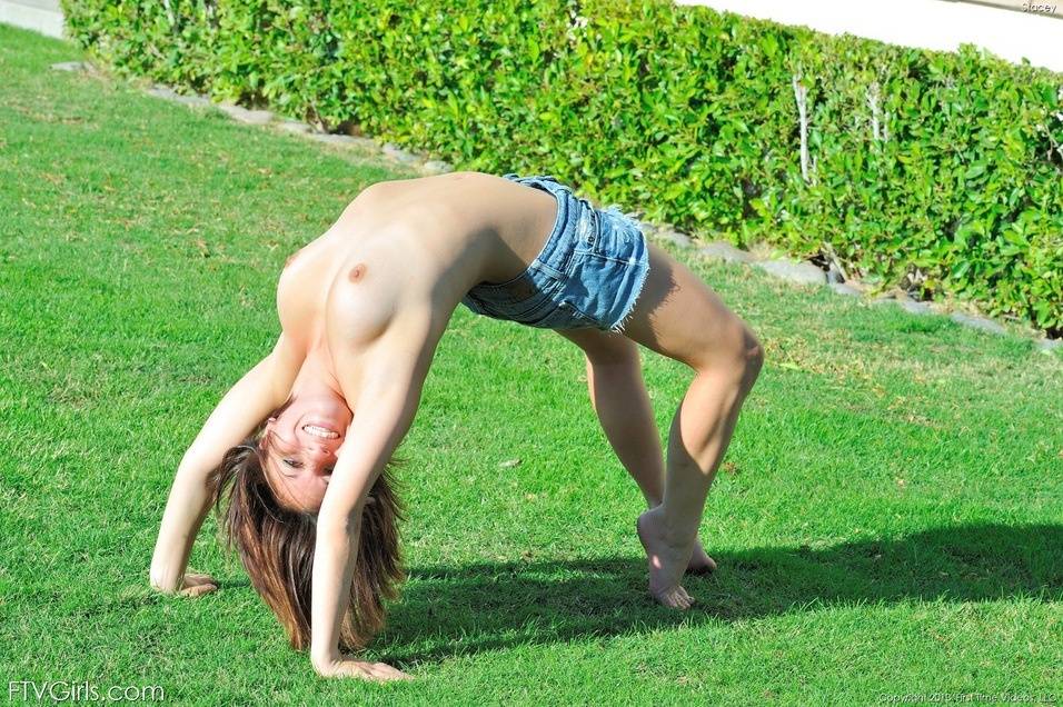 Flexible teen performs topless gymnastics at a park before going naked indoors - #15