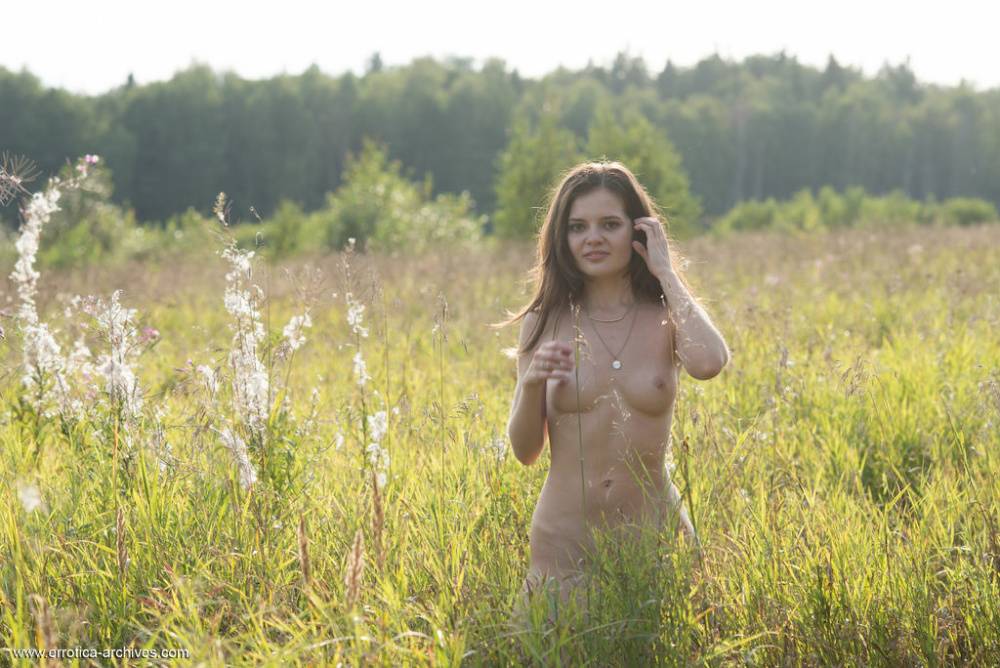 Caucasian teen Pola Des disrobes while taking a walk on a country lane - #14