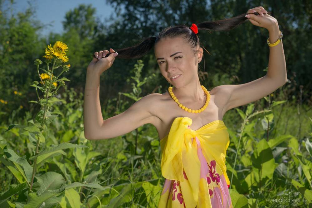 Petite brunette teen Kina A gets naked while on a butterfly hunting expedition - #4