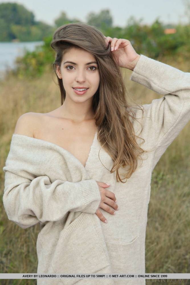 Long haired teen Avery gets completely naked on a blanket in a field - #5