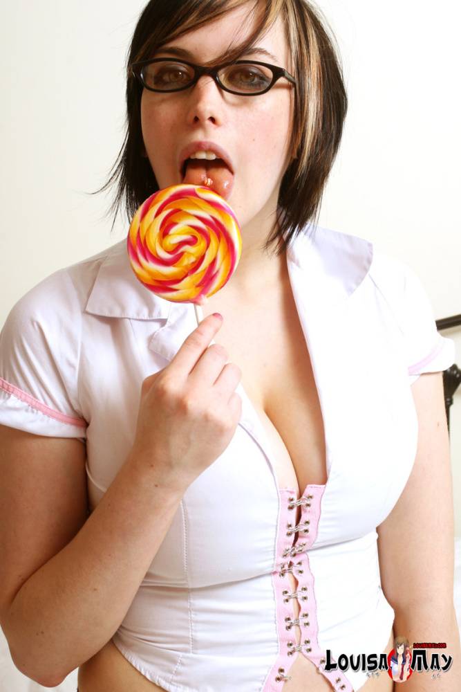 Amateur candy lover Louisa May reveals her killer tits while having a lollipop - #6