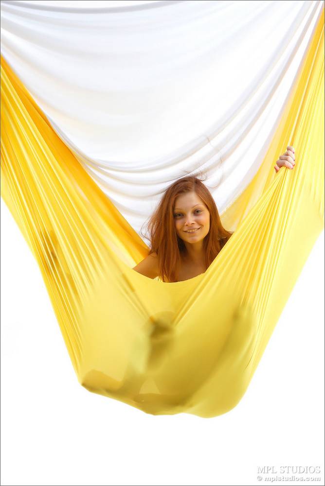 Natural redhead strikes great totally nude poses on a hammock - #3