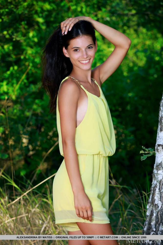 Nice teen Aleksandrina exposes her tan lined body by a hardwood tree - #12
