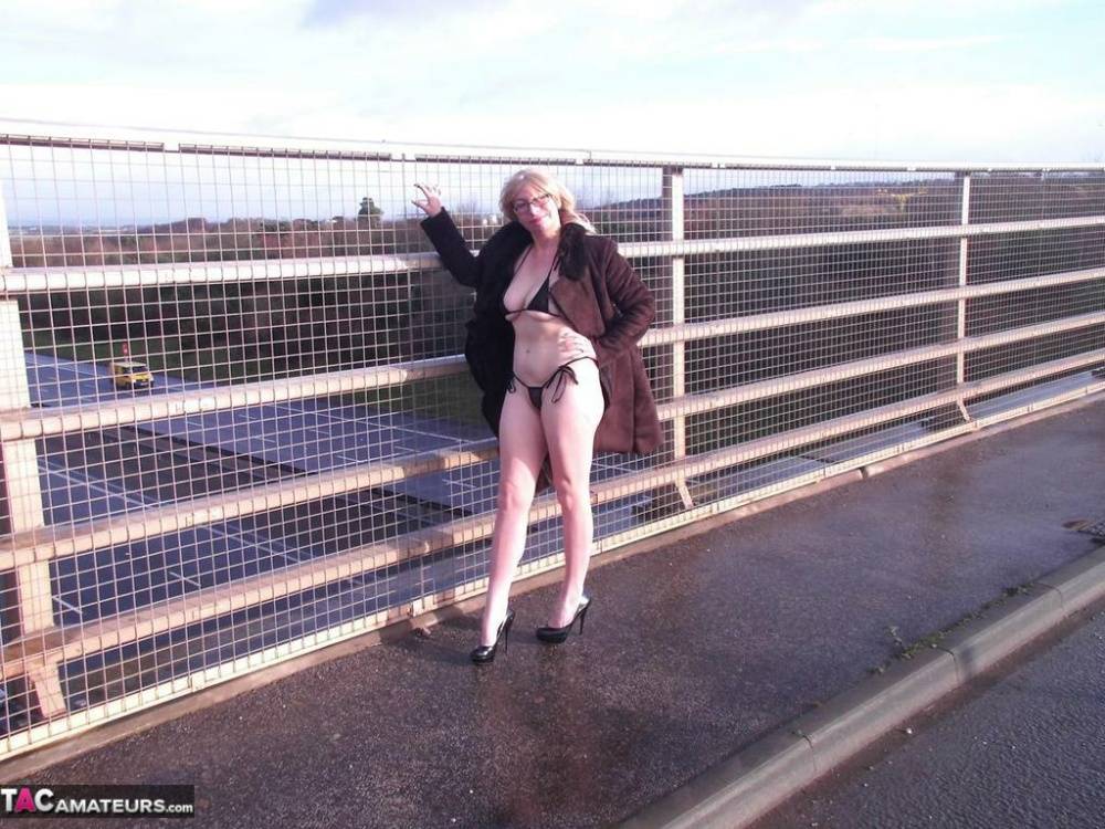 Older amateur Barby Slut flashes on a sidewalk upon an overpass - #16