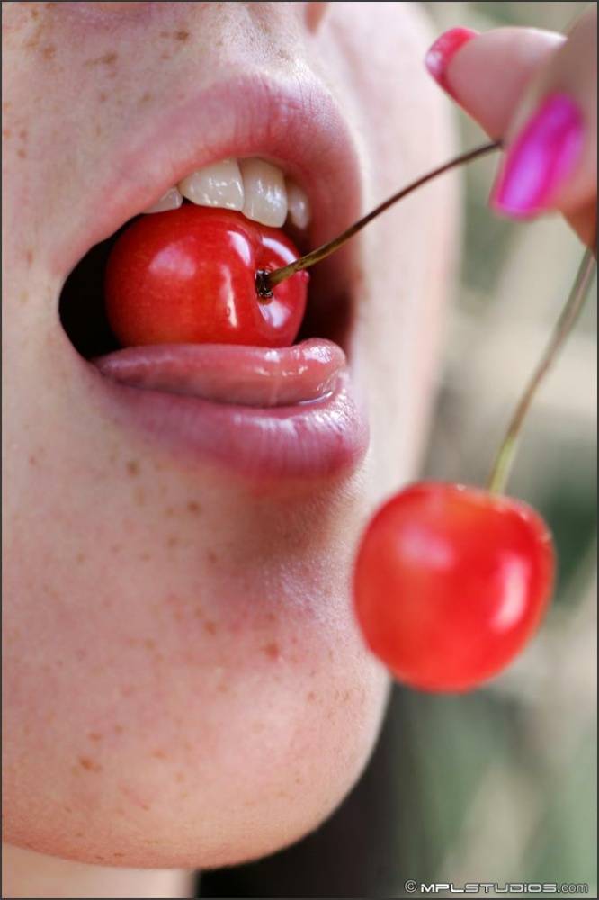 Totally naked teen eats cherries while lounging on a seaside hammock - #9