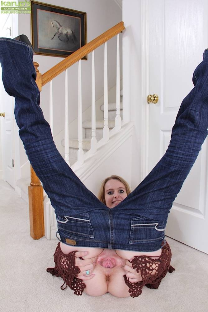 Aged blonde woman Annabelle pulling down jeans to expose pink cunt - #5