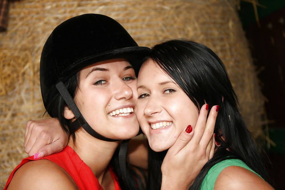 Hot lesbians Lucy Lee & Angelica playing with a dildo in the horse barn - #15
