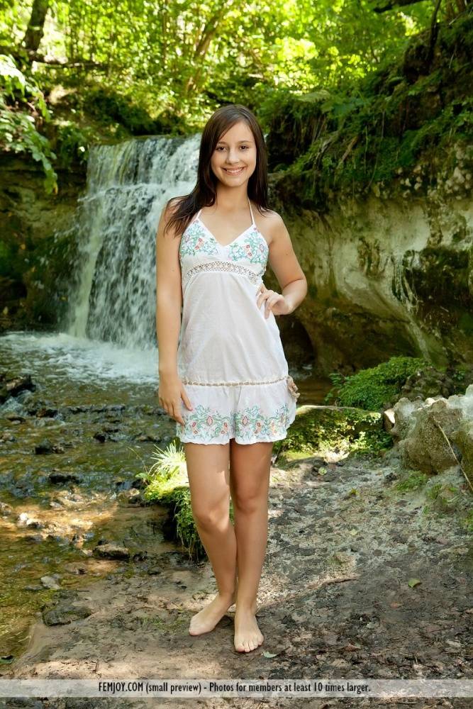 Solo girl Rosalin E removes lingerie to model naked in front of a waterfall - #4