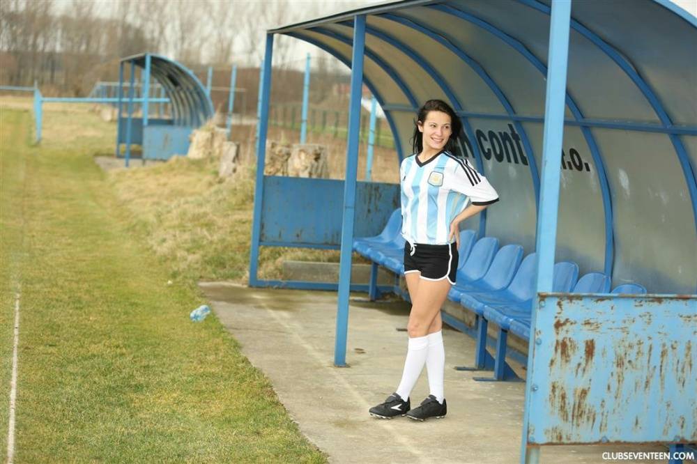 Barely legal soccer player removes her uniform before masturbating on a bench - #13