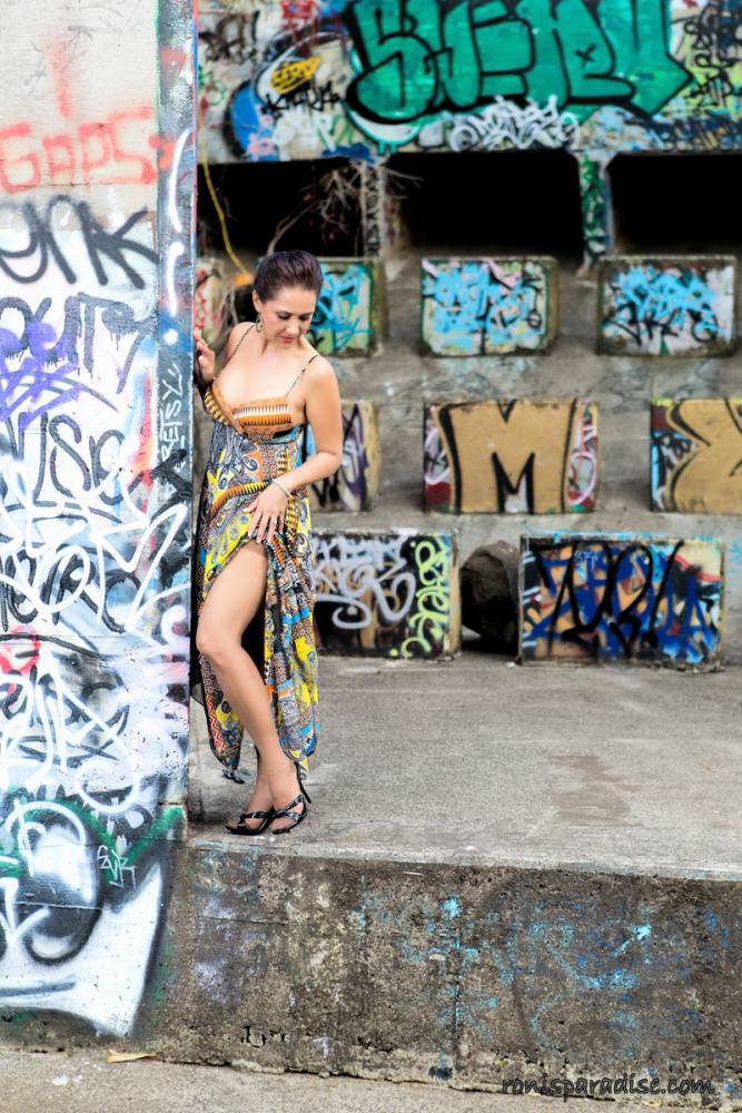Mature wife Roni Ford removes dress and hose to model naked afore graffiti - #1