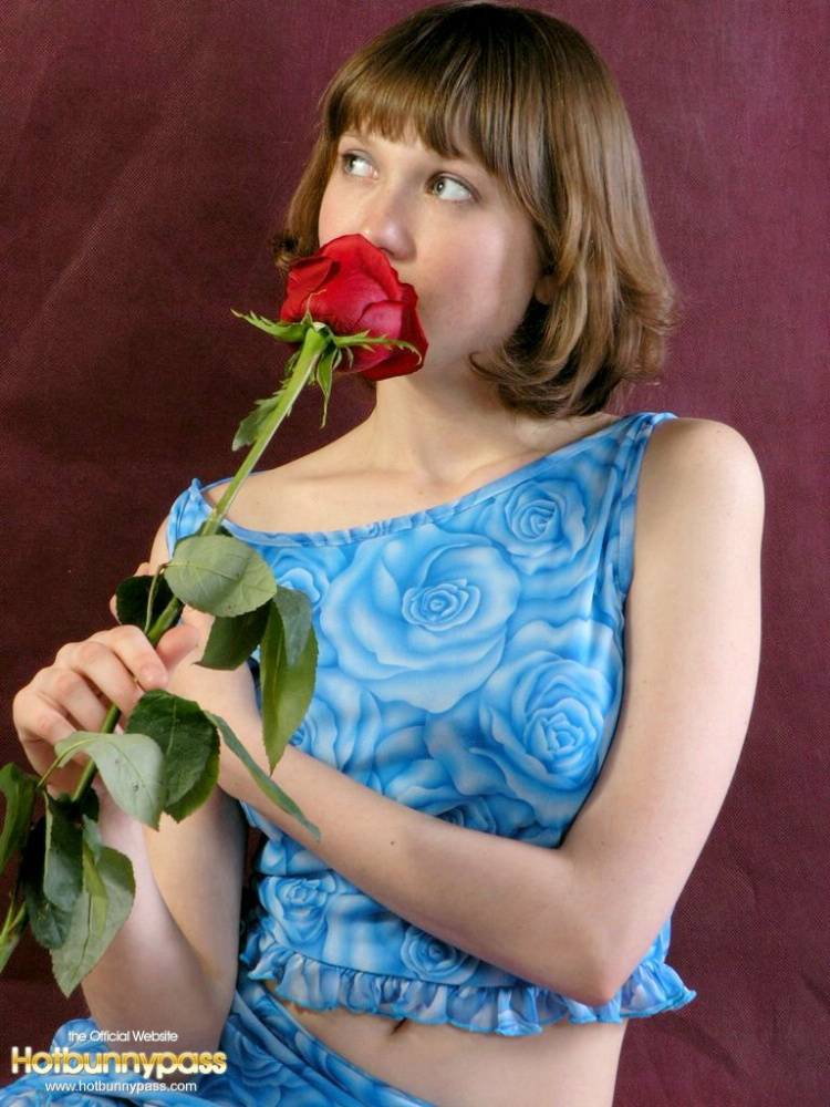 Adorable teen Anabell sniffs a red rose before taking off her clothes - #4