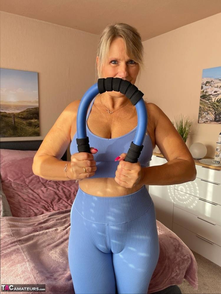Fit middle-aged woman sports a camel toe before showing her tits and pussy - #3
