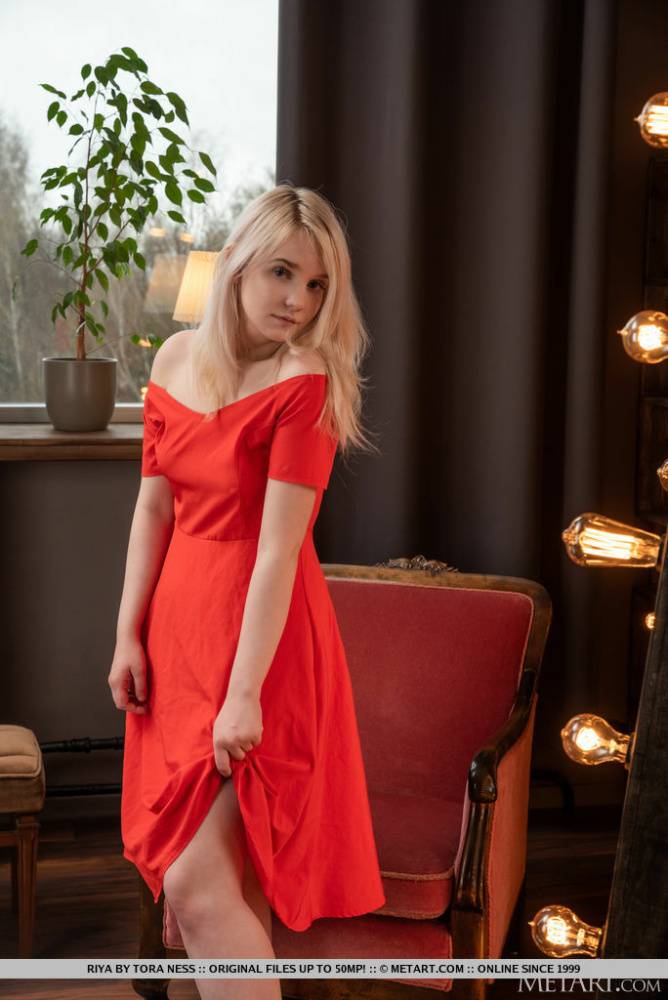 Young blonde Riya doffs a red dress for a nude modelling appearance - #10