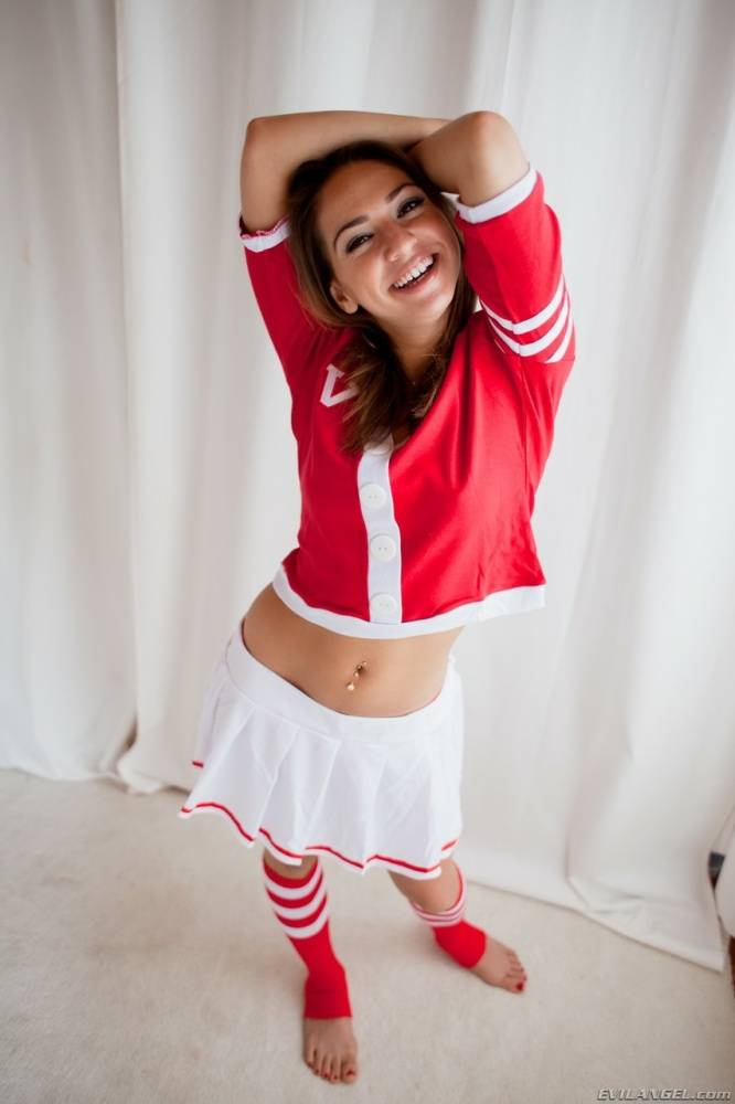 Cute brunette cheerleader flashing young tits and ass in sports socks - #8