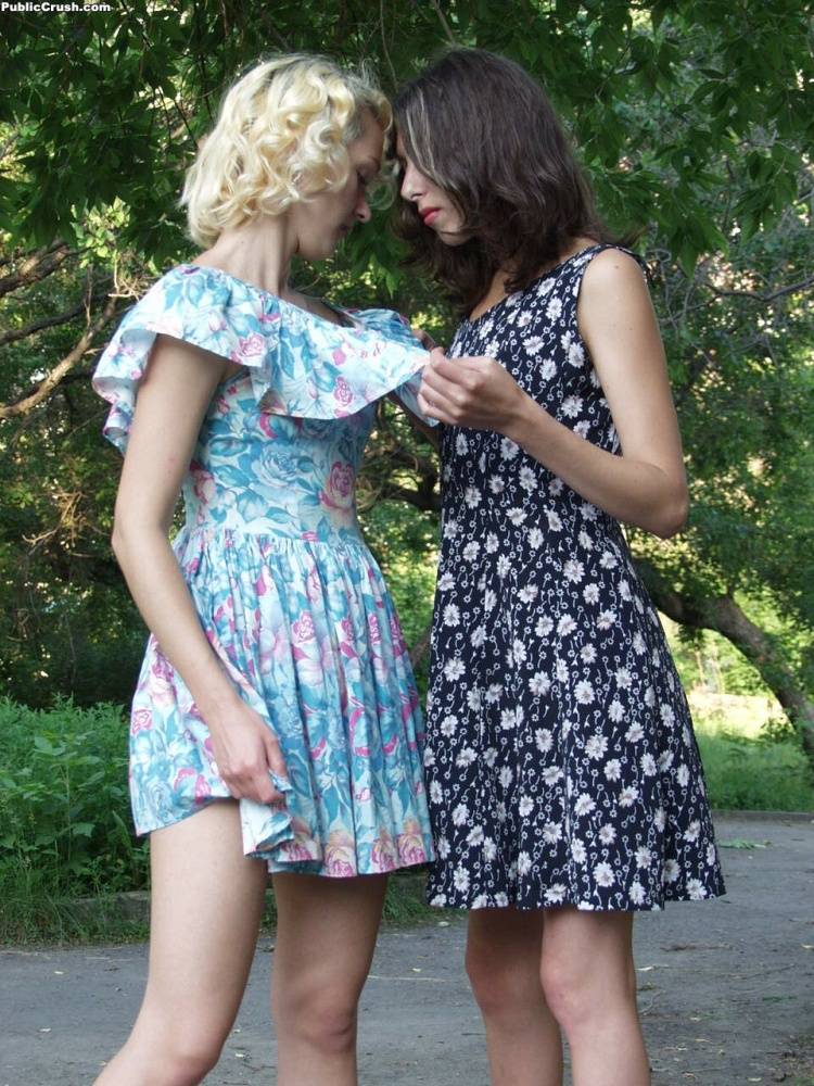 Young lesbians in summer dresses tongue kiss and lick pussy on a park pathway - #3