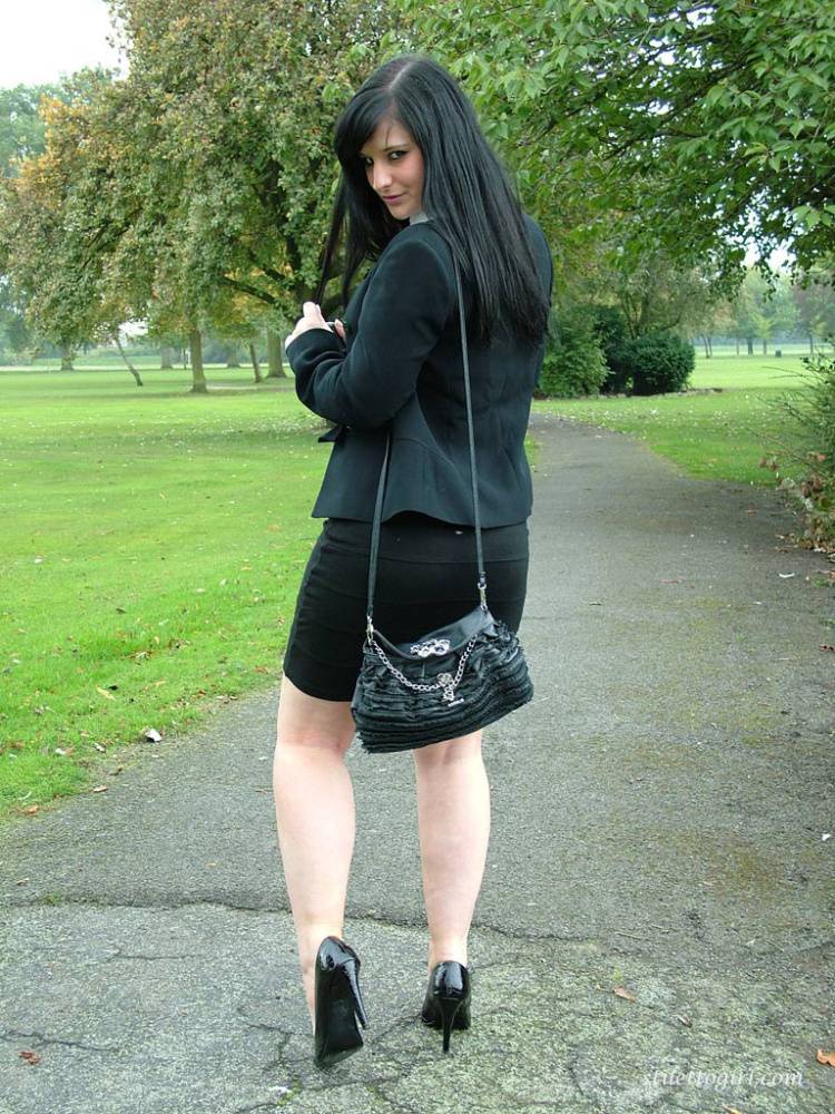Fully clothed model Nicola takes a walk on park pathway in her new black pumps - #13