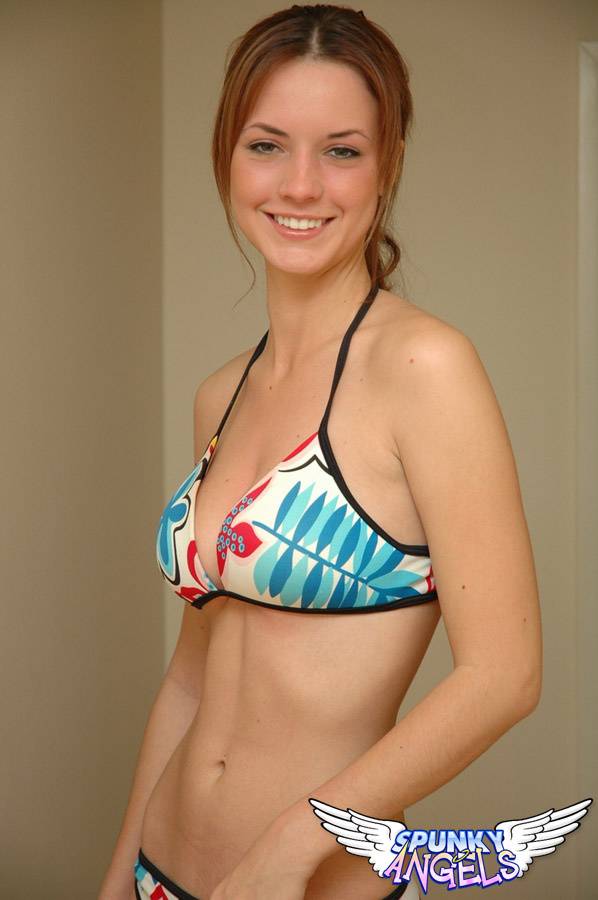 Young solo girl Amy wears a smile while posing non nude in a string bikini - #10