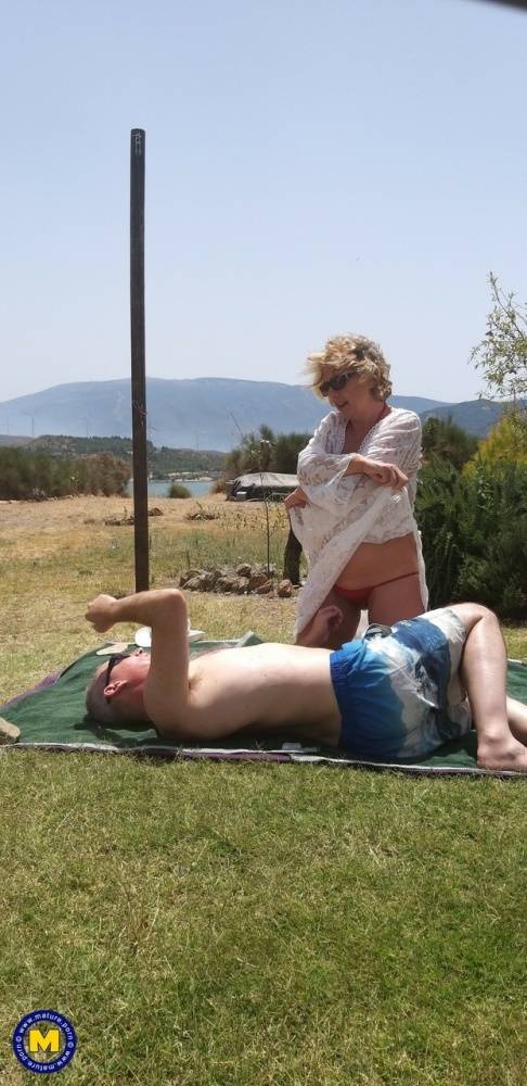 Mature amateur sports a creampie after sex atop a picnic table - #8